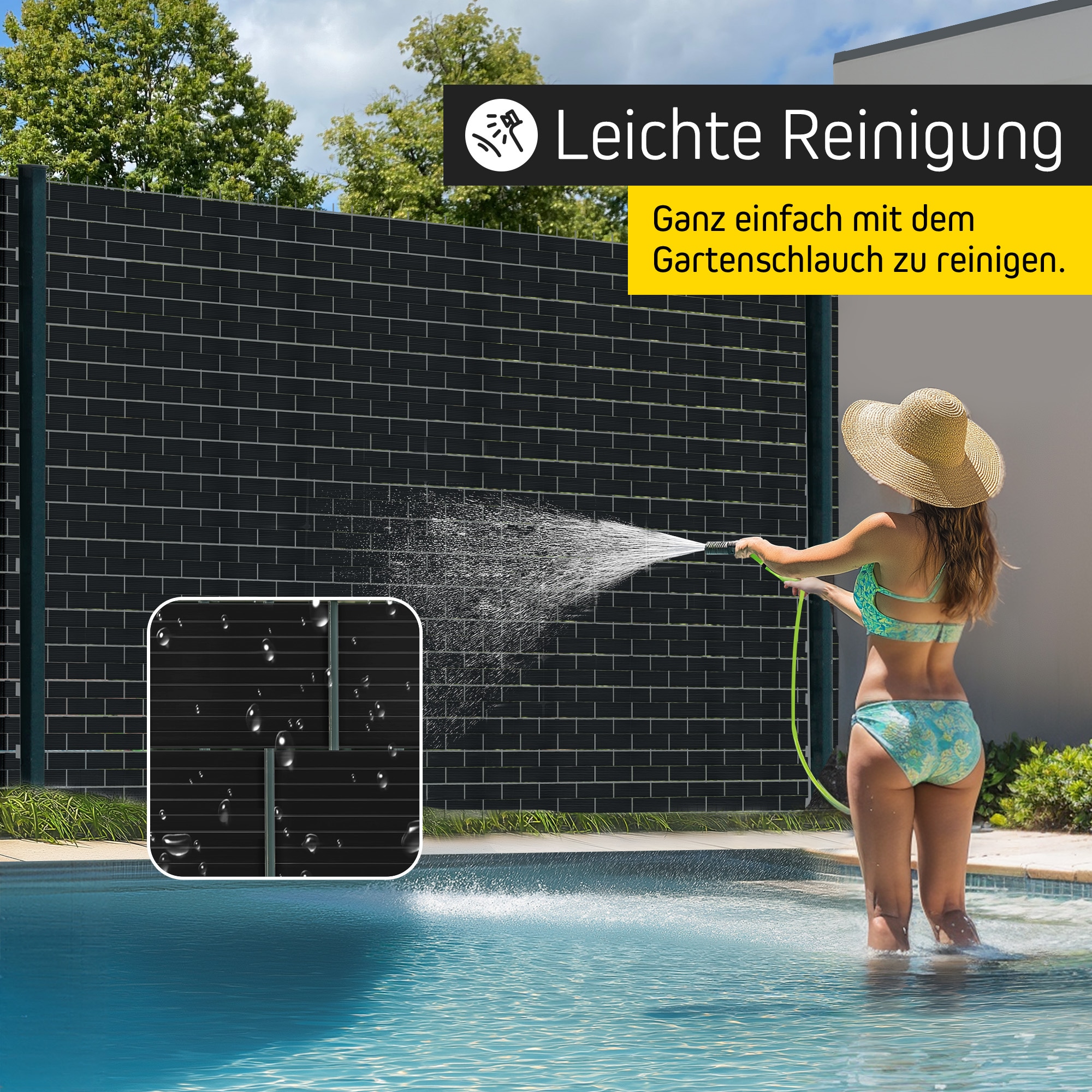 Person spritzt Wasser auf eine Wand mit Gartenschlauch, einfache Reinigung demonstriert